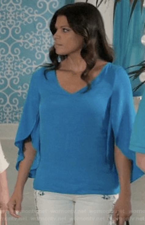 Xiomara from Jane the Virgin - flowy blue blouse and white jeans