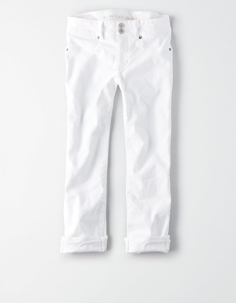 White denim capri pants rolled up.