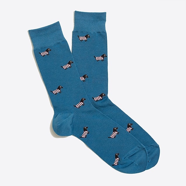 Medium teal-blue socks with design featuring small Dachshunds in striped sweaters