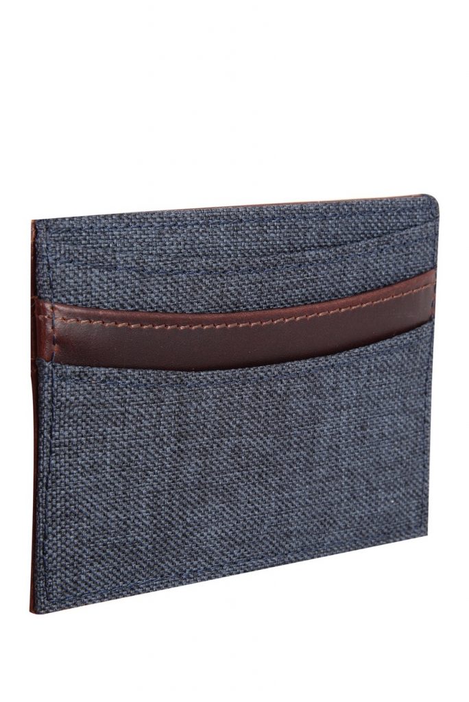 Navy blue fabric and brown leather card case