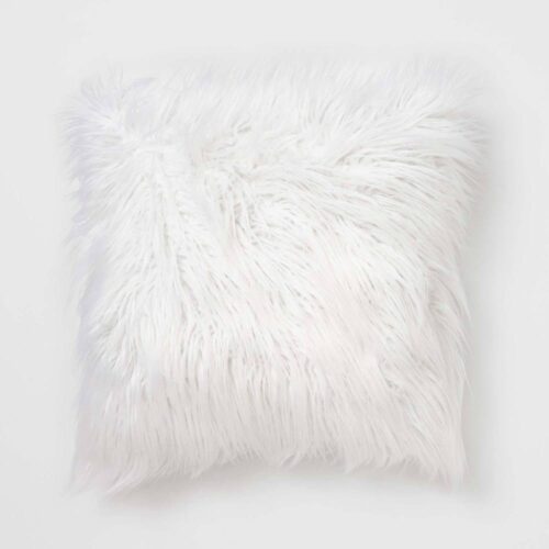 White faux mongolian fur pillow for dorm rooms from Dormify 