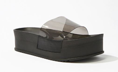 A flatform sandal with a clear vinyl panel