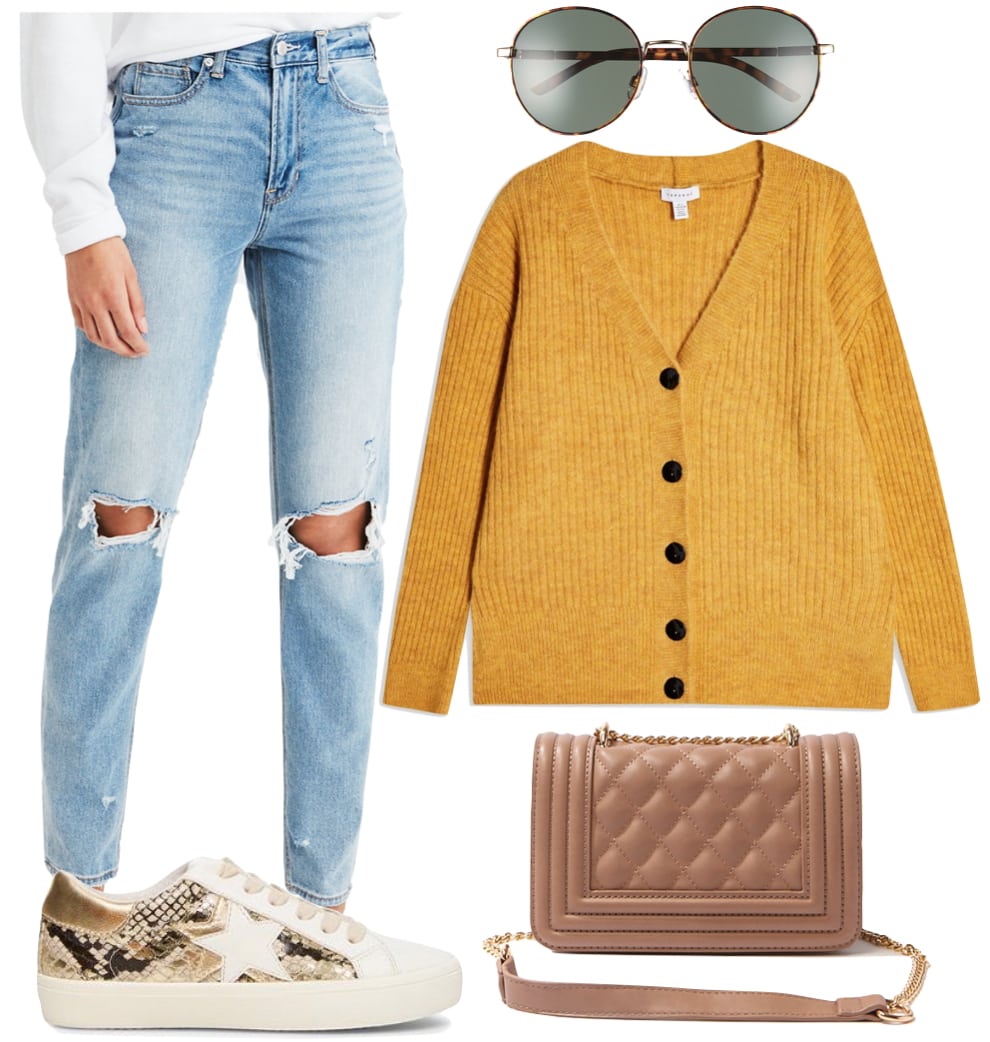 Lucy Hale London Outfit 2: ripped knee mom jeans, yellow cardigan sweater, round sunglasses, taupe quilted chainlink crossbody bag, and white low top snake print sneakers