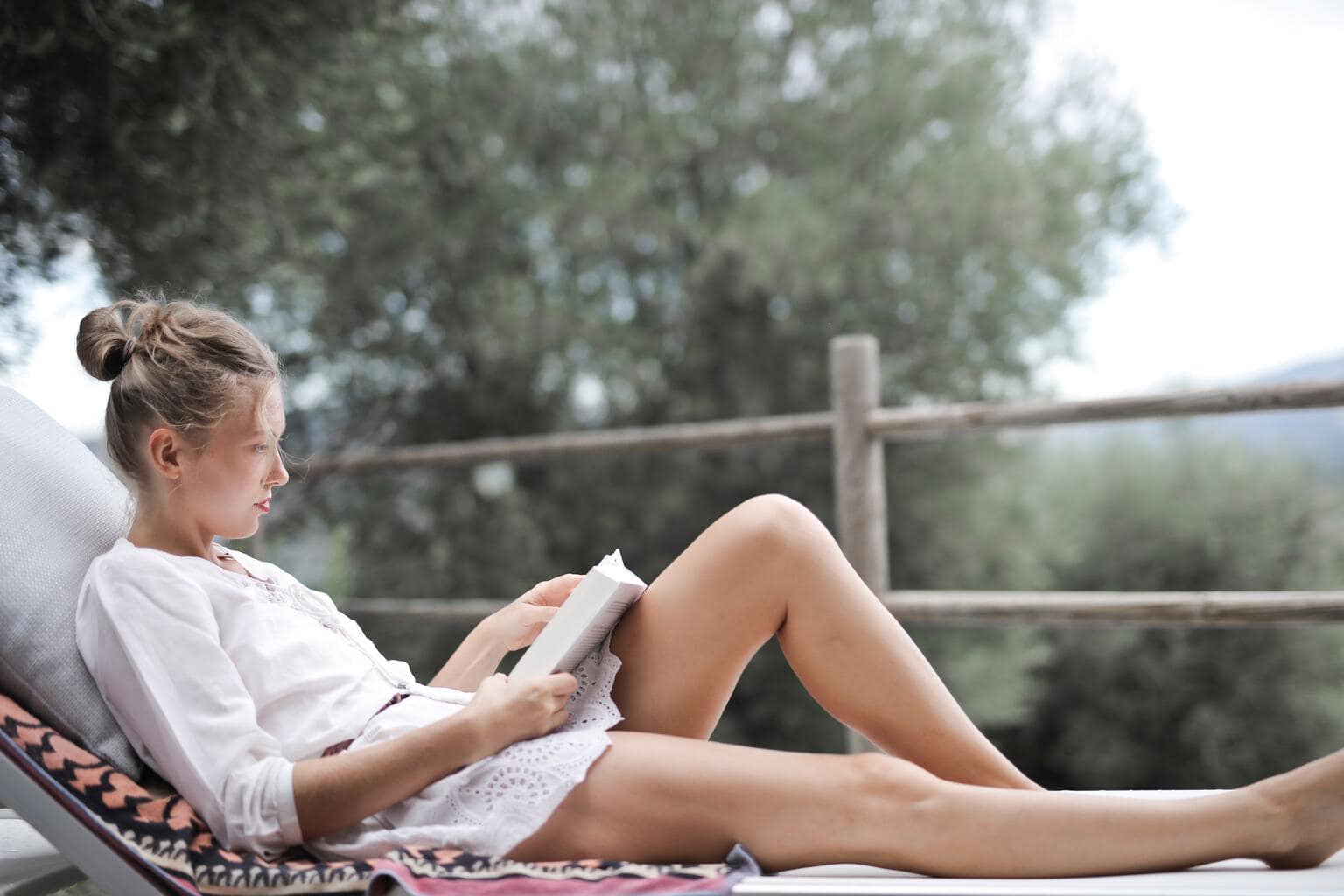 Woman reading a book.
