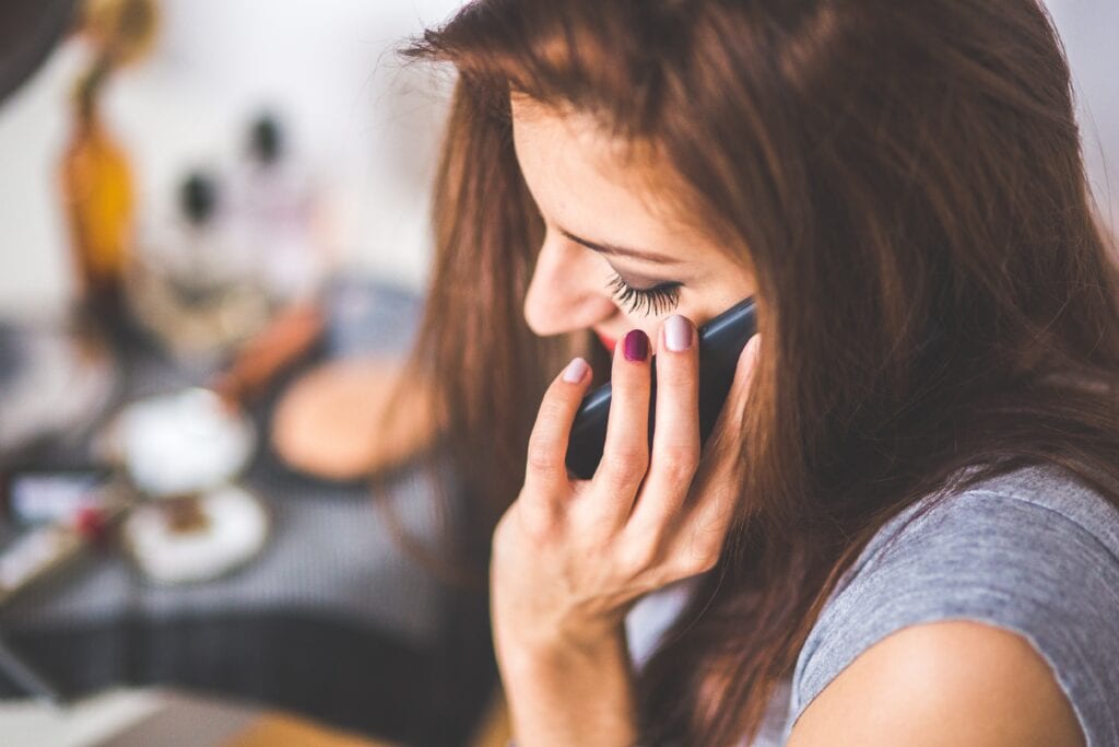 Woman talking on the phone.