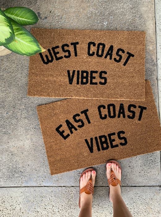 "West coast vibes" + "East coast vibes" doormats.