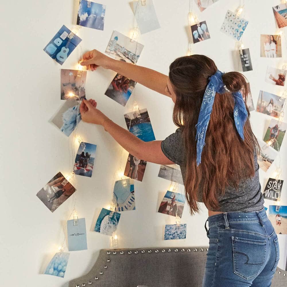 Photo wall ideas for college - string clip lights with photos