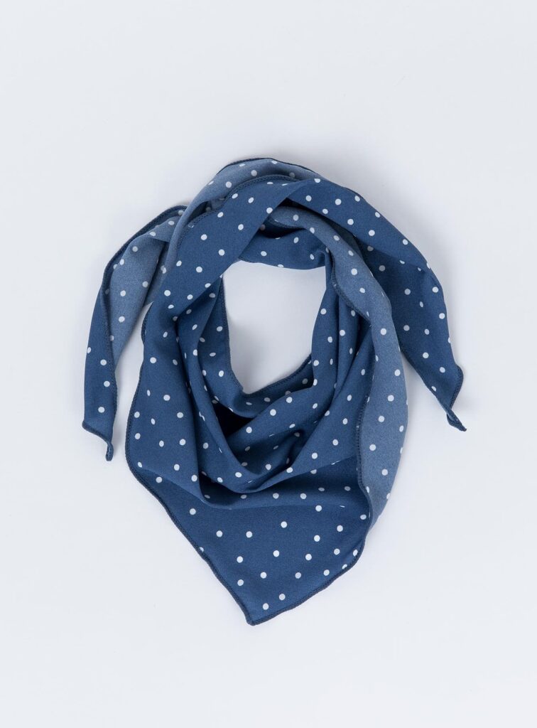 Blue scarf with white polka dots