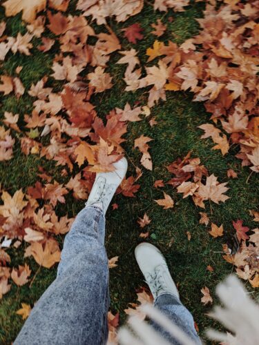 Walking on fallen leaves.