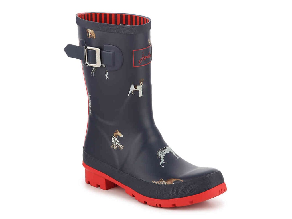 Seven Cute Pairs of Rain Boots to Jazz Up Your Rainy Day Look: Joules Molly Welly Rain Boot in navy blue with dog print with bright red sole 