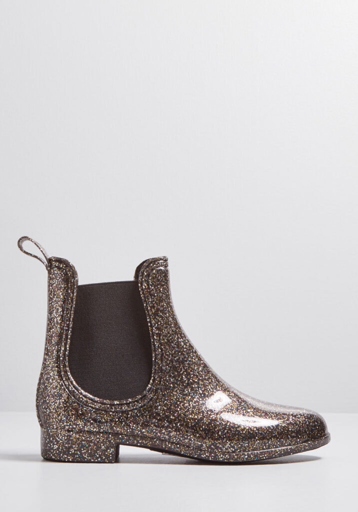 Seven Cute Pairs of Rain Boots to Jazz Up Your Rainy Day Look: Report Footwear Slicker Rain Boot in pewter glitter 