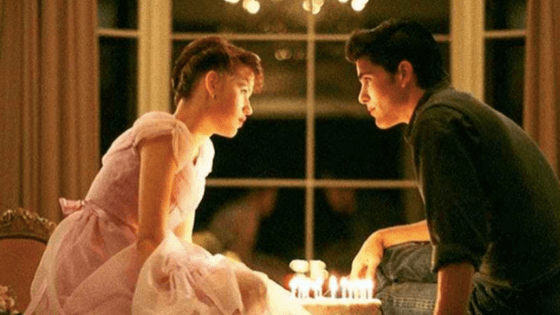 Sixteen Candles fashion - shot of Samantha and Jake Ryan with birthday cake