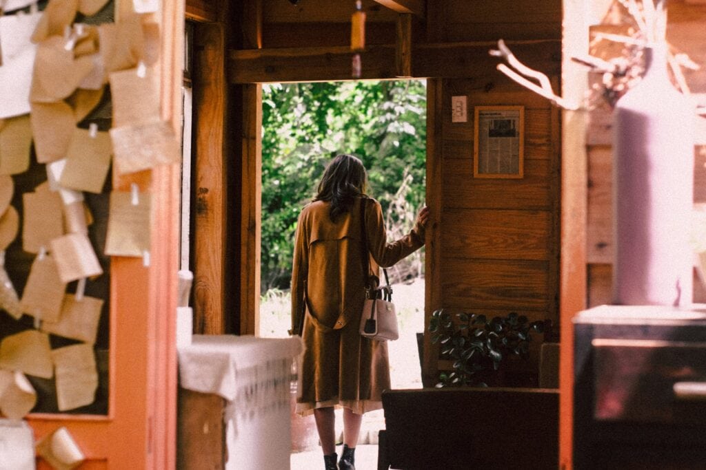 woman standing in doorway