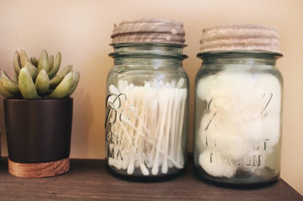 mason jars with cotton swabs and cotton balls