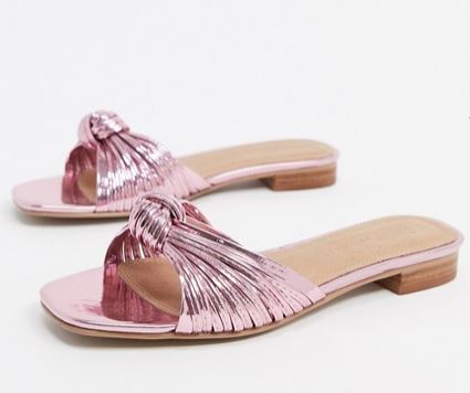 Metallic pink slides.