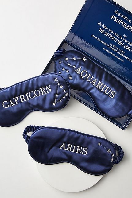 Embroidered zodiac sleep mask.