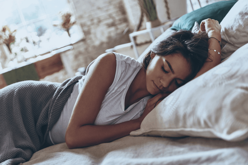 Woman getting her sleep schedule on track after an all nighter