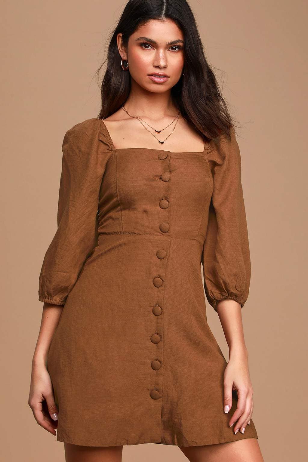 How to Wear Brown: header image of girl in brown button front dress with puff sleeves.