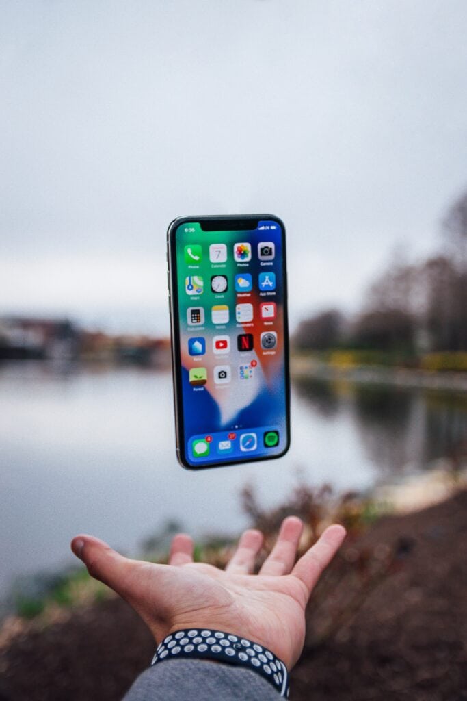 iphone floating over hand