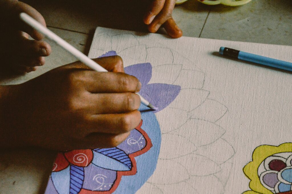 Close up of mandala painting on white paper