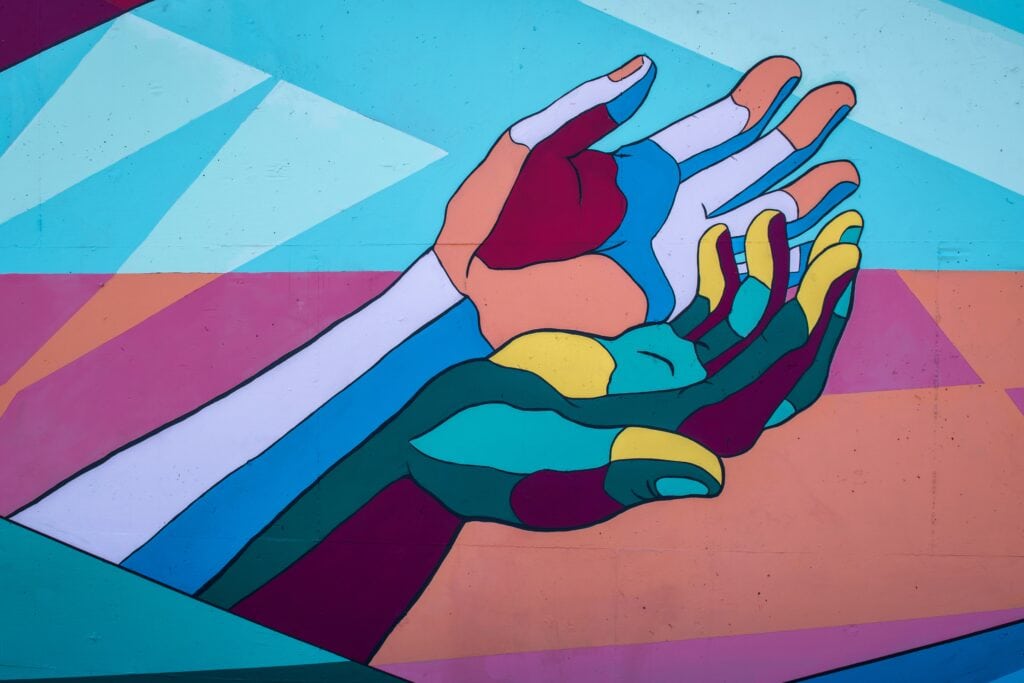 painting of colorful hands