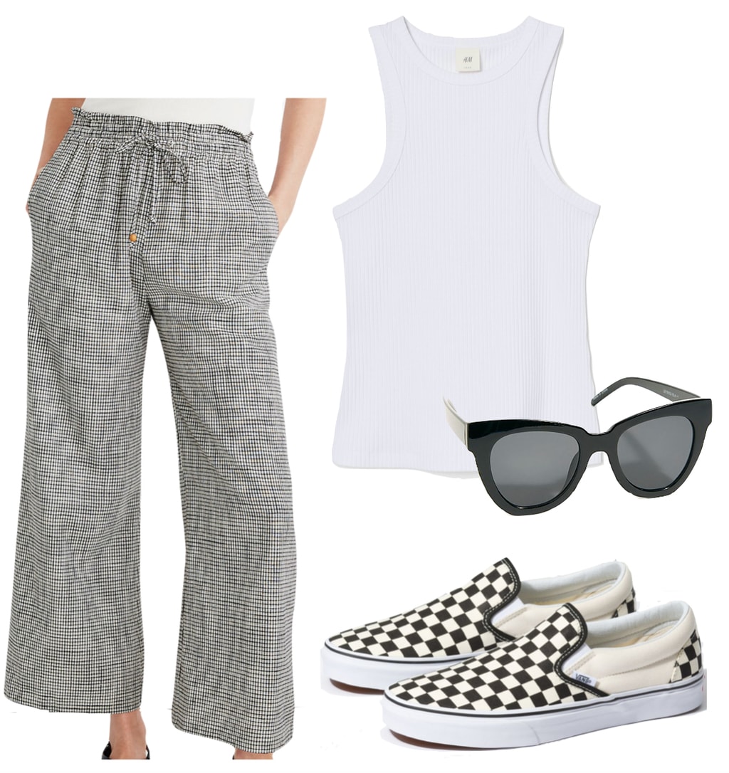 Dakota Johnson Outfit #3: white tank top, black oversized sunglasses, black and white checked pants, Vans black and white checkerboard slip on sneakers