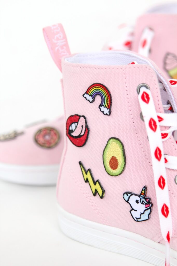 pink converse with mini patches