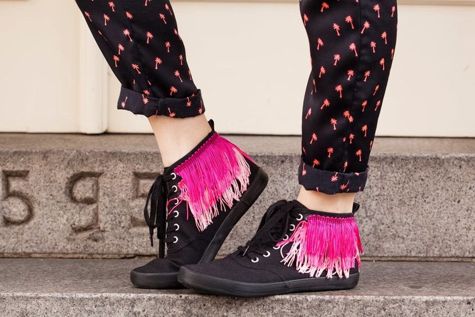 black high tops with pink fringe