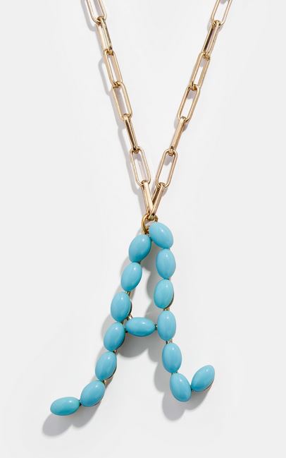 2020 jewelry trends: Beaded initial jewelry. Example of a blue letter necklace.