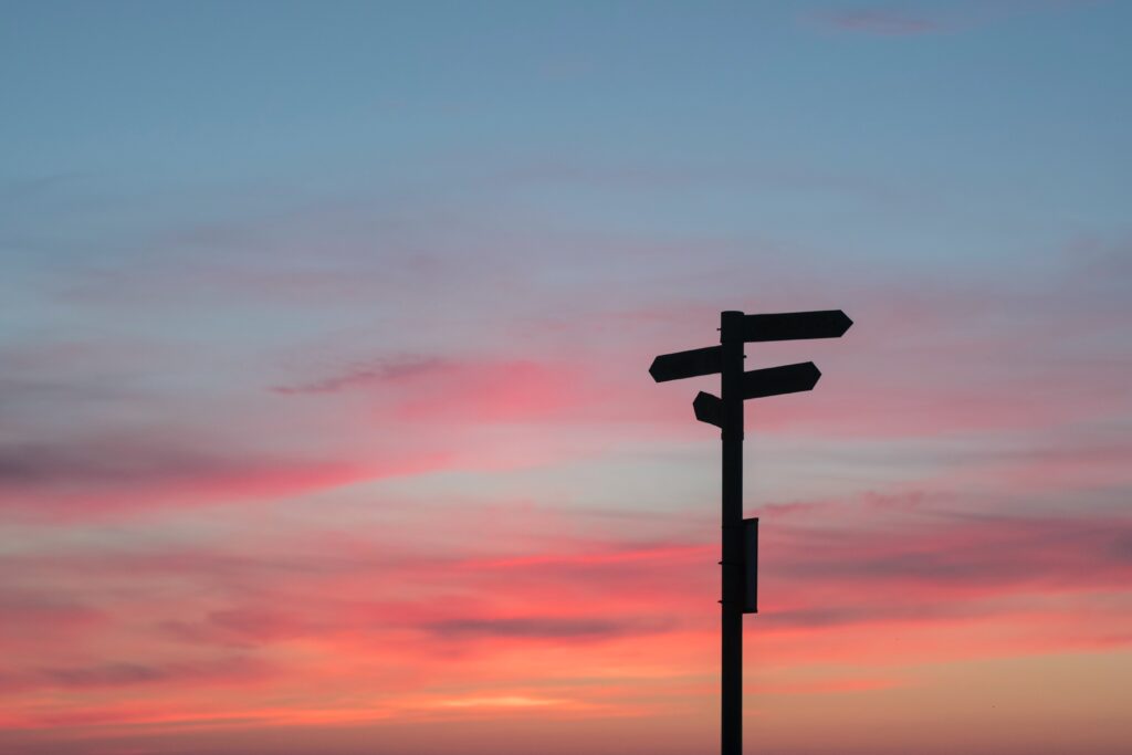 sign silhouette against sunset