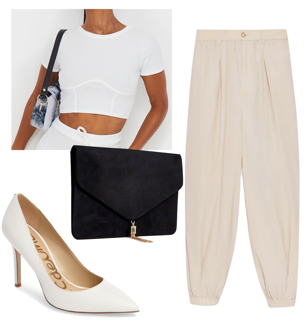 Vanessa Hudgens Outfit: white corset crop t-shirt, beige cuffed pants, white pointy toe pumps, and a black rectangular clutch bag