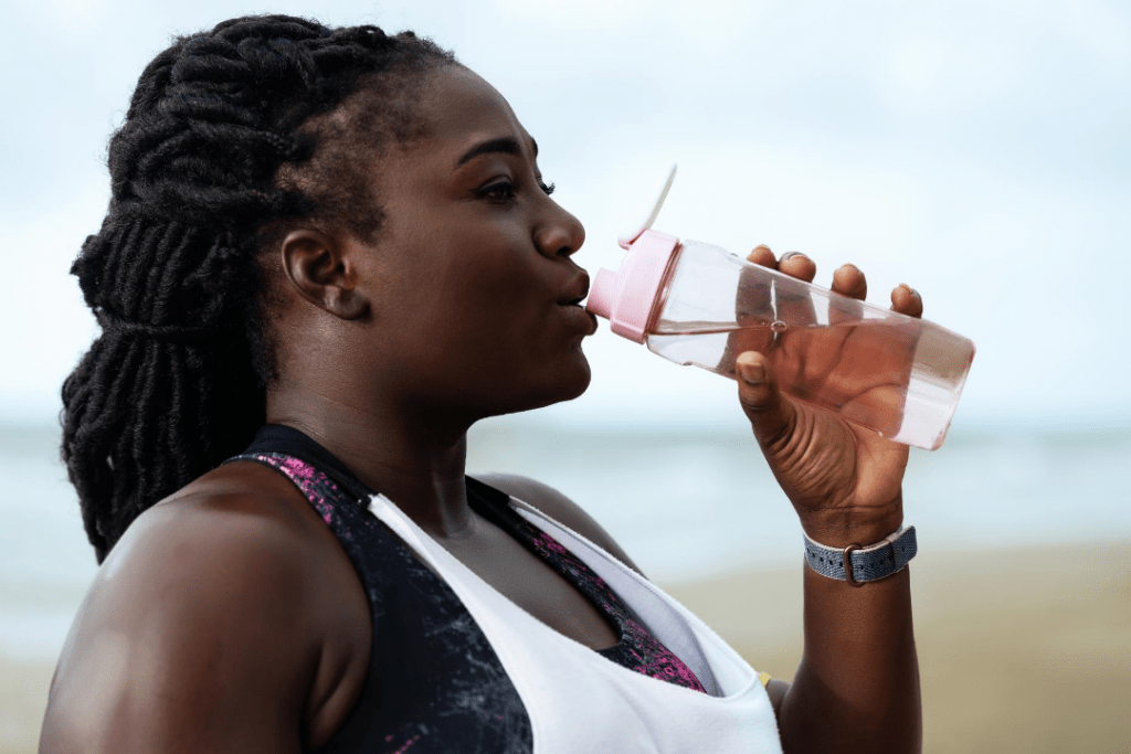 Photo of a woman drinking water