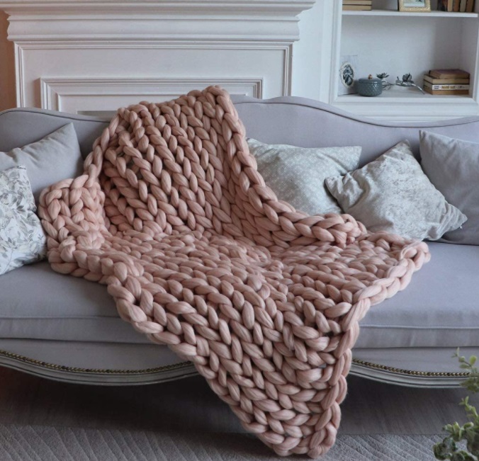 big knit rose colored blanket