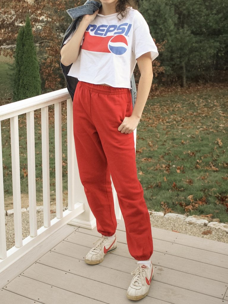 Photo of the author's outfit with sweatpants and a graphic tee