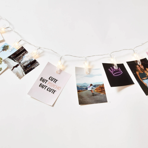 Cute string lights with photo clips - lights on wall in bedroom