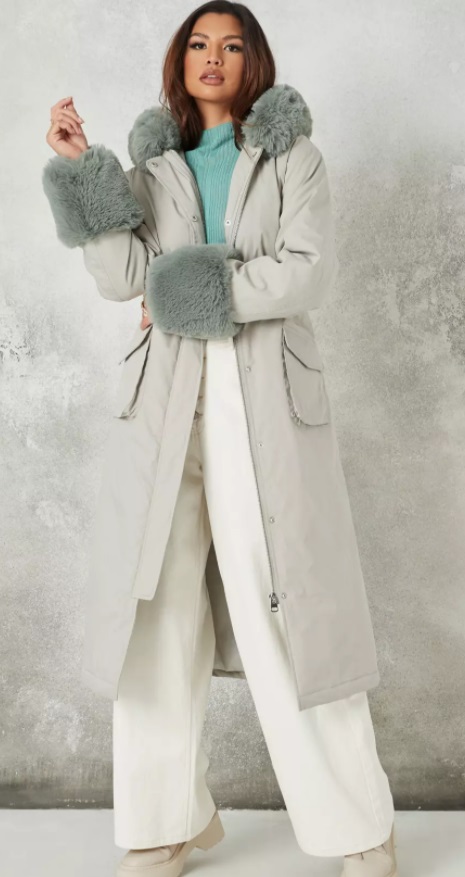 Long statement coat with grey-green cuffs and hood fur