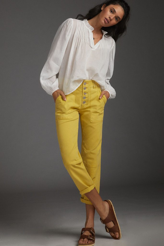 cropped cuffed yellow high-waisted jeans