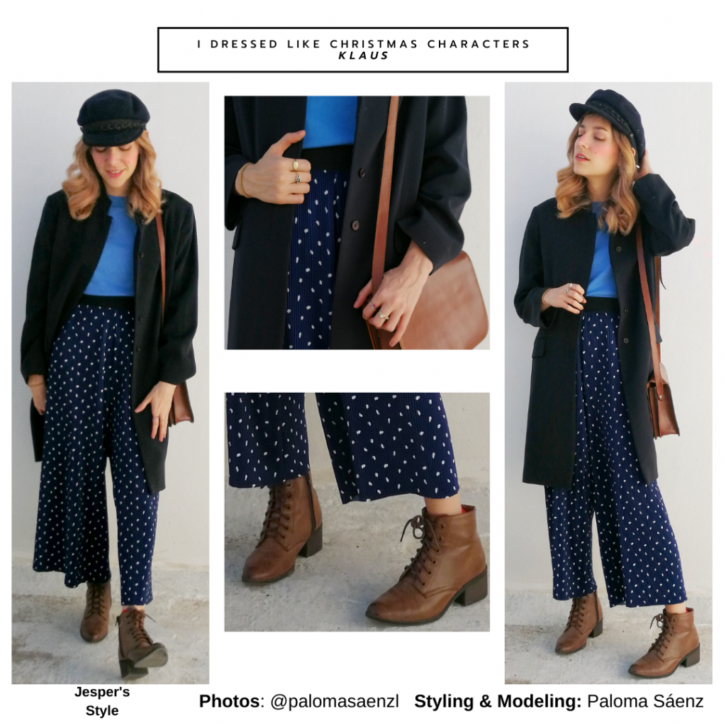 Christmas movie outfit inspired by Jesper from Klaus with polka dot pants, blue top, long coat, brown boots, crossbody bag, baker boy cap