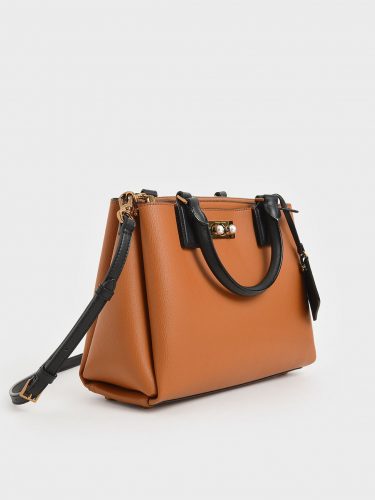 Classic bag: brown and black structured purse from Charles & Keith