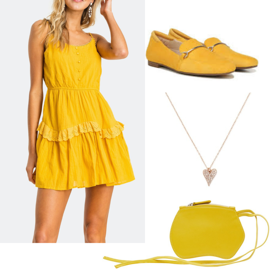 A full yellow outfit including dress, shoes and heart pendant. 