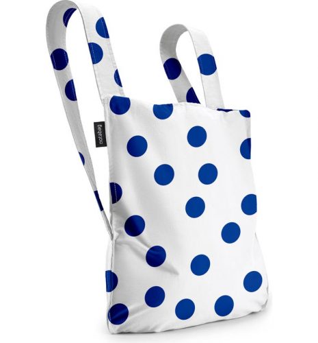 A tote bag with blue polka dots.