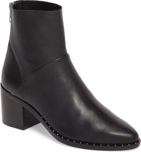 Comfortable winter shoes: A black heeled boot with studs.