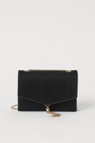 Timeless bag: black crossbody bag with gold tassel and chain strap from H&M