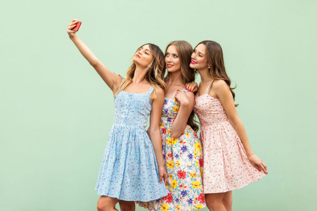 Woman taking photo with friends