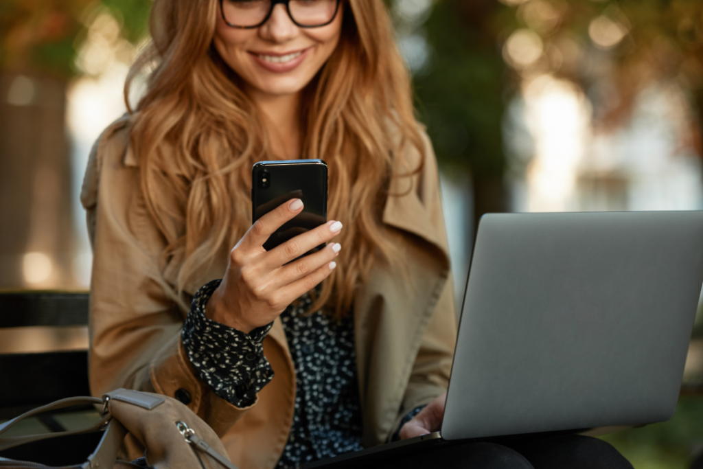 Photo of a woman using a smartphone