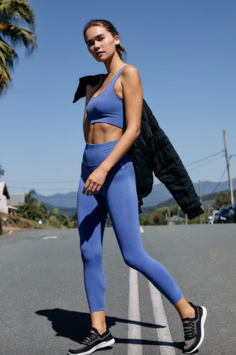 Free People blue workout set with sports bra and matching leggings with ribbed trim