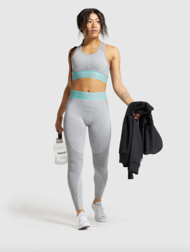 Gymshark sports bra and tights workout set in grey with torquoise trim