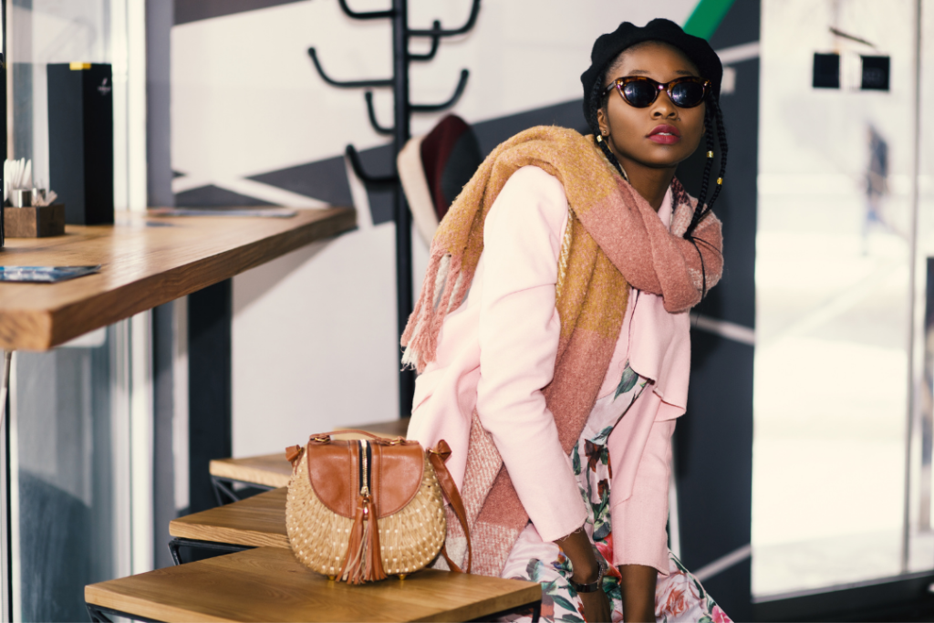 Fashionista wearing a scarf draped across her shoulder