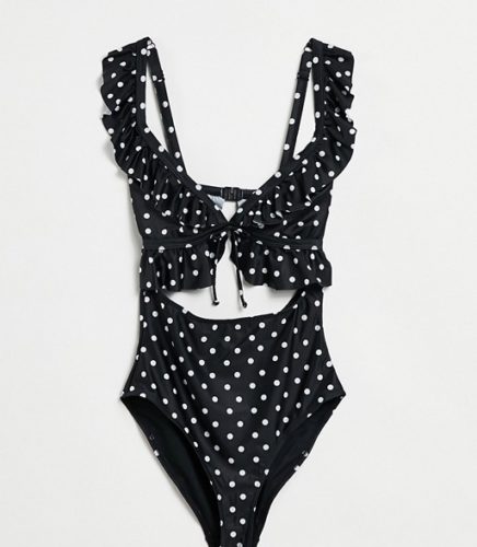 Black and white polka dot monokini with ruffle detailing on the top and shoulders