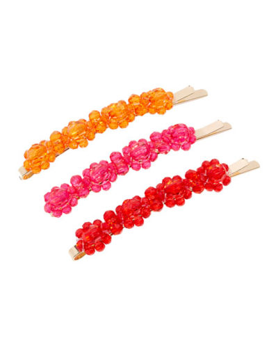 Orange, pink, and red hair clips. 